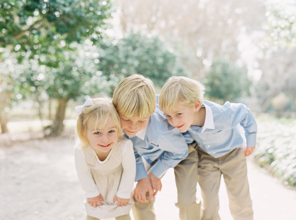 siblings looking down/Lucy Cuneo