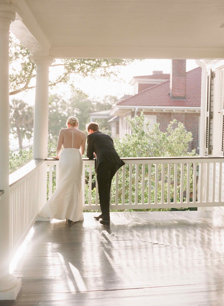 Bride and groom on porch