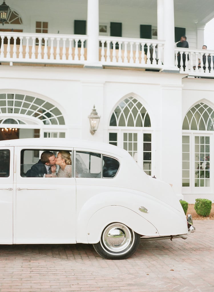 bride-and-groom-in-car