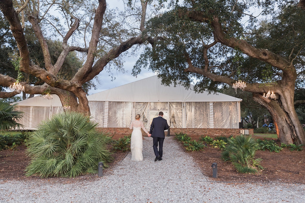 bride-and-groom-outside-tent